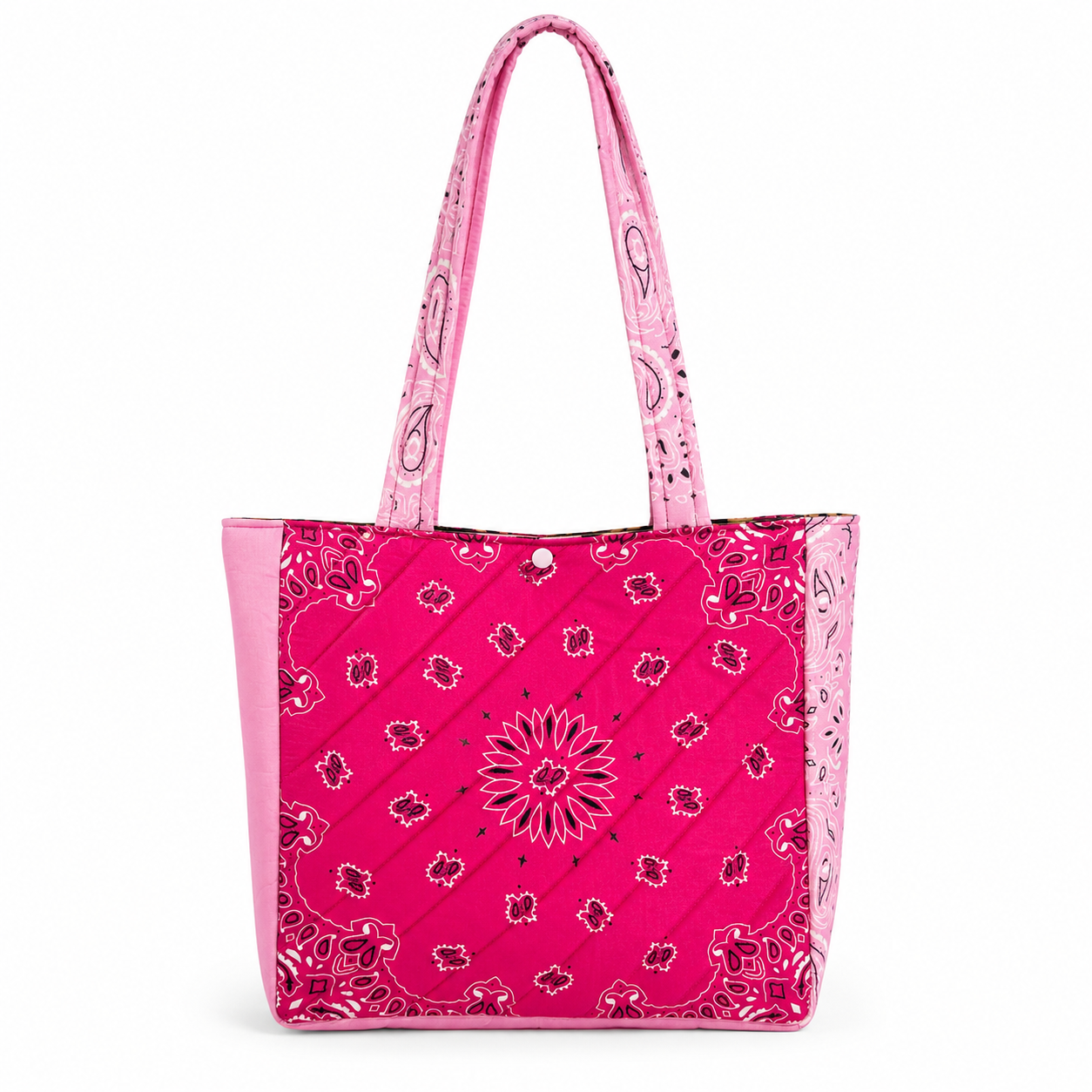 Handmade pink bandana quilted tote bag with light pink straps on white background.