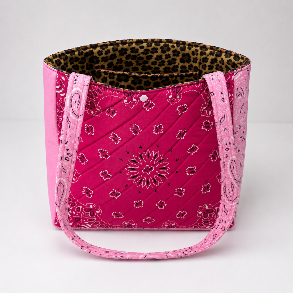 Handmade pink tote bag with cheetah print lining and inside pocket.